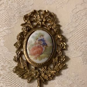 Three ornate Victorian oval framed tiles.